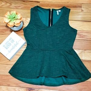 ELLE Sleeveless Vneck Peplum top